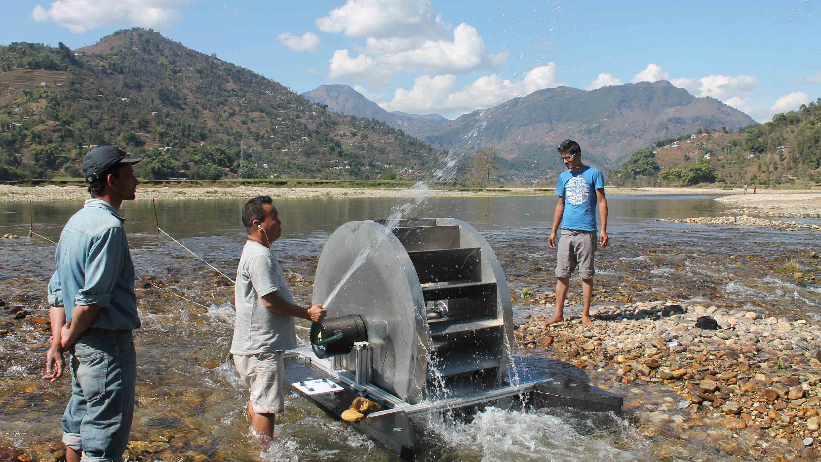 People and turbine in the river