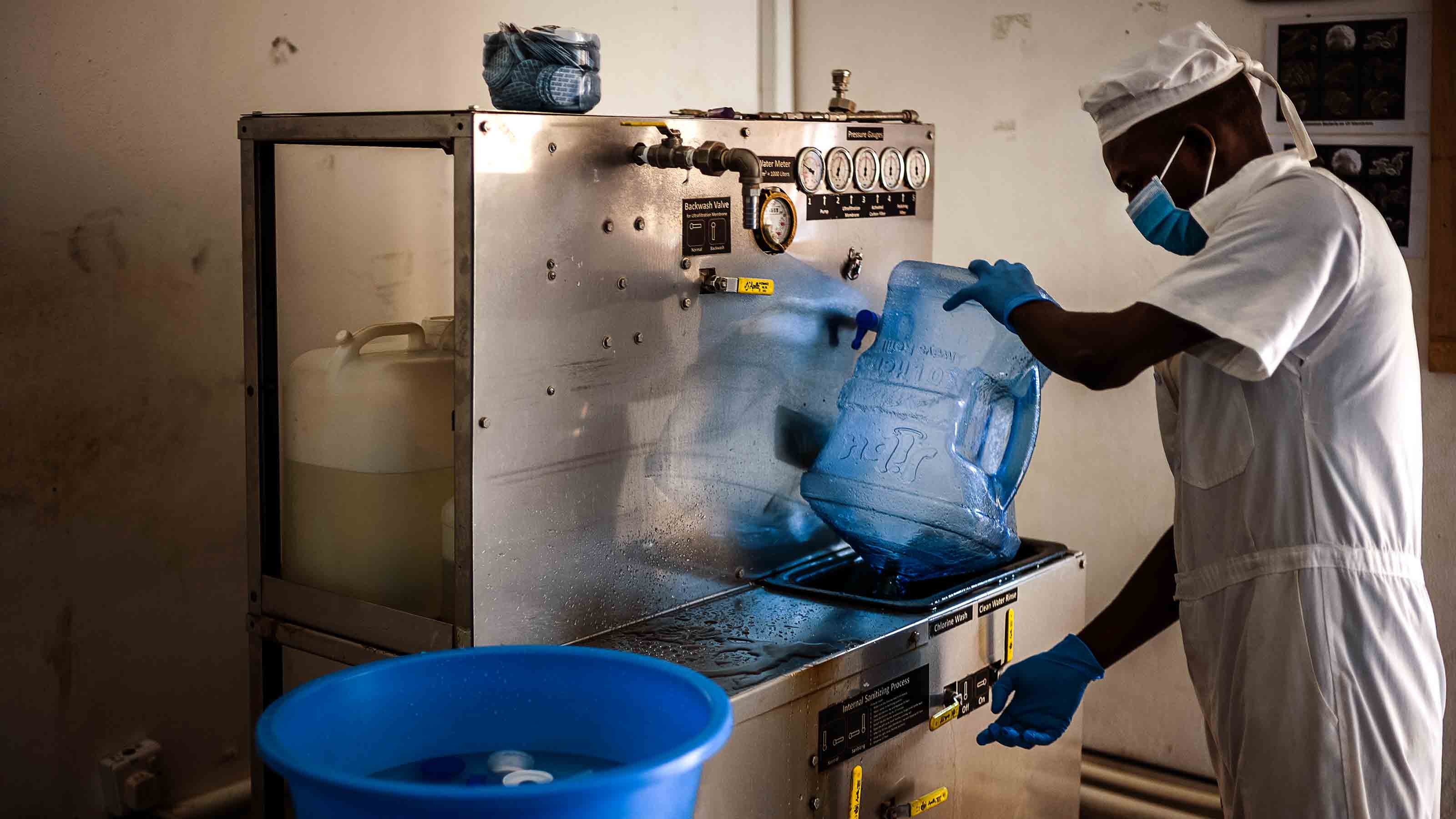 Jibu staff filling water