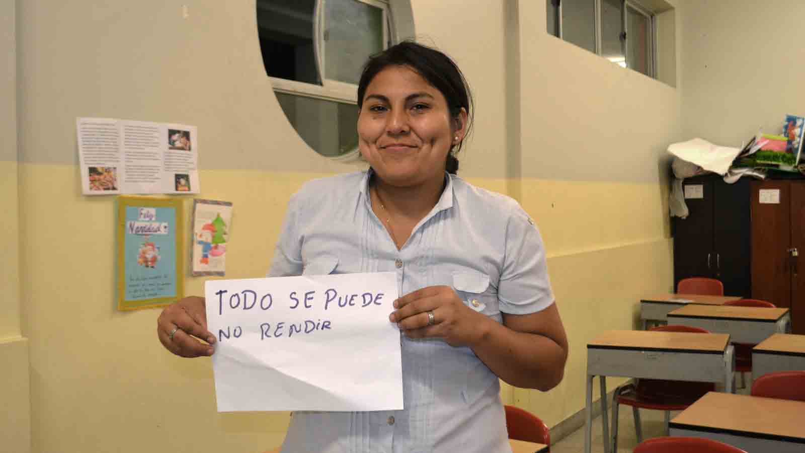 Woman posting a sign