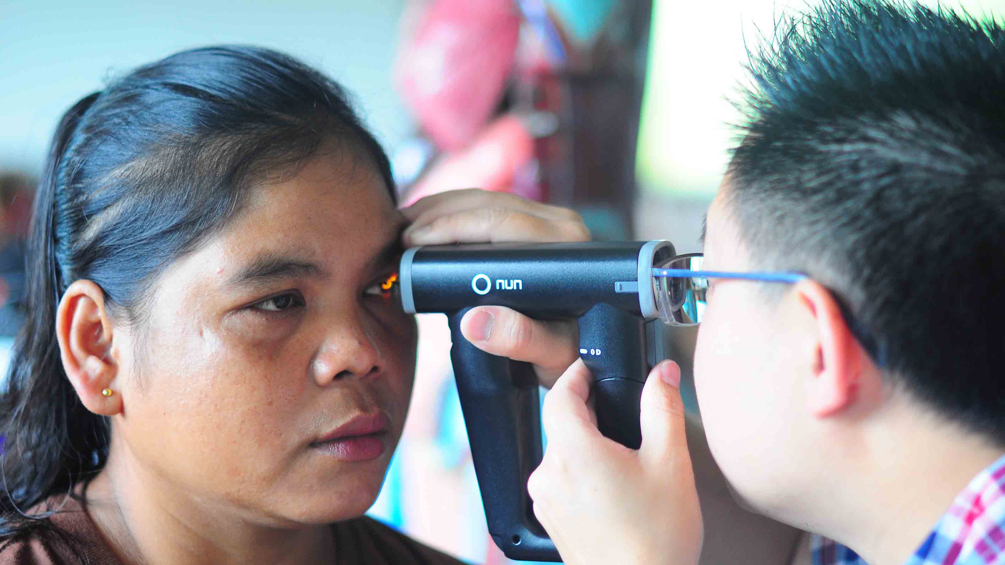 Woman getting her eye checked