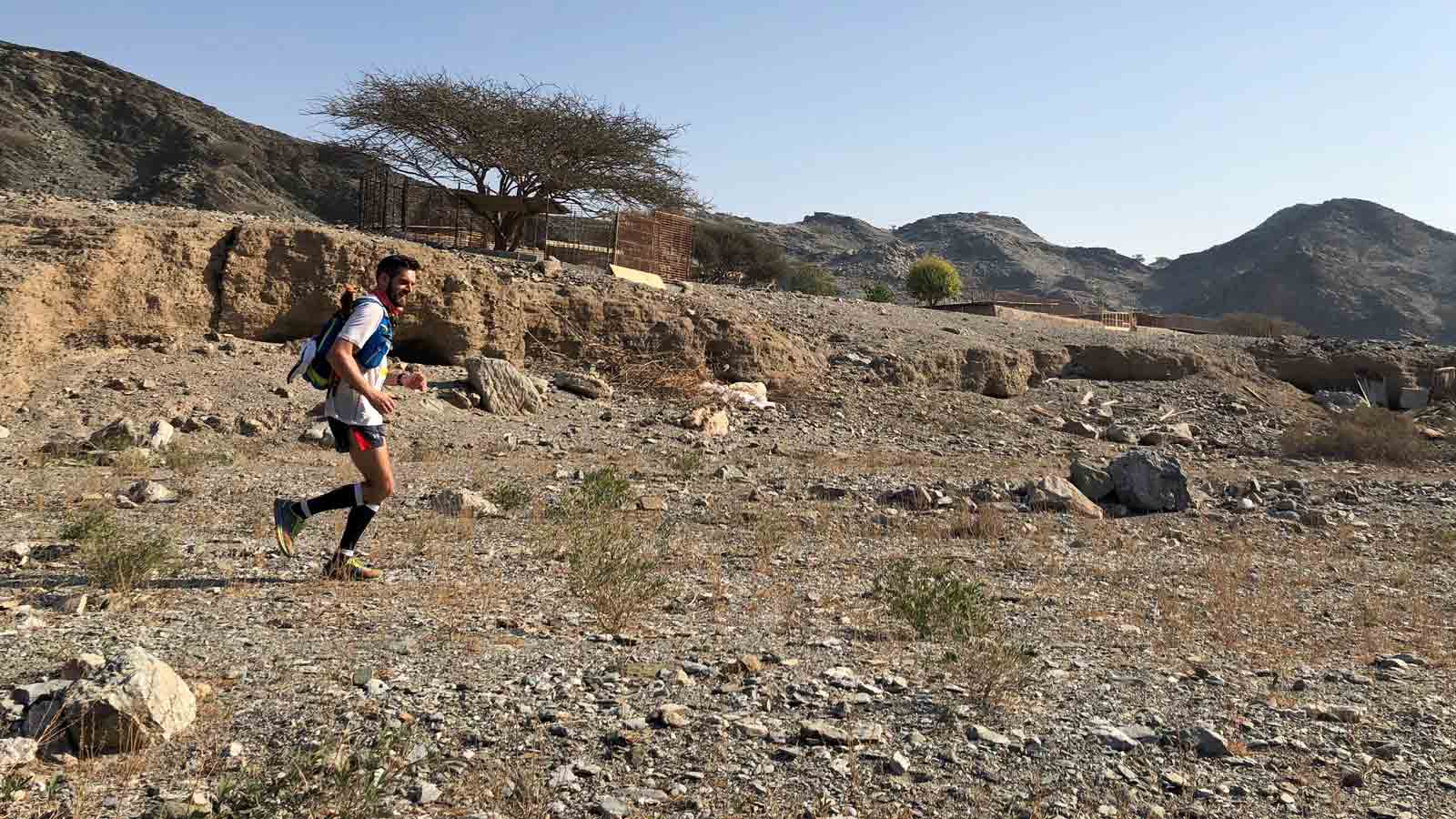 Man trail running the desert
