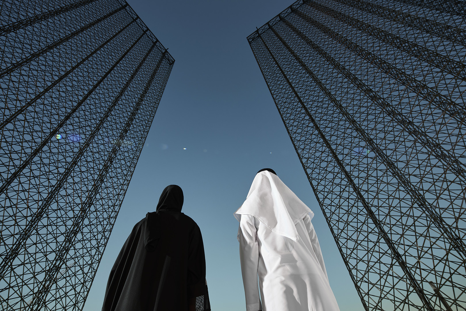 Emirati couple staring at Expo portal